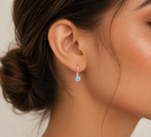 Celeste Solitaire Drop Earrings in 925 sterling silver – angle view