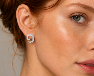 Celestia Spiral Crystal Stud Earrings in 925 sterling silver – angle view