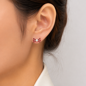 Celestial Pearl Bow Stud Earrings in 925 sterling silver – angle view