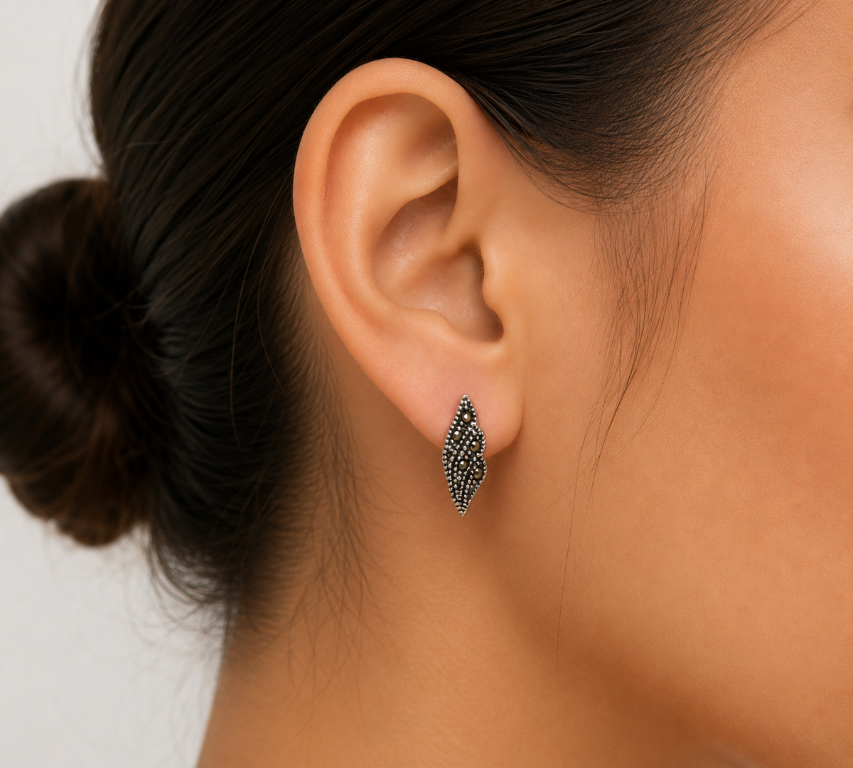 Midnight Teardrop Marcasite Stud Earrings in 925 sterling silver – angle view